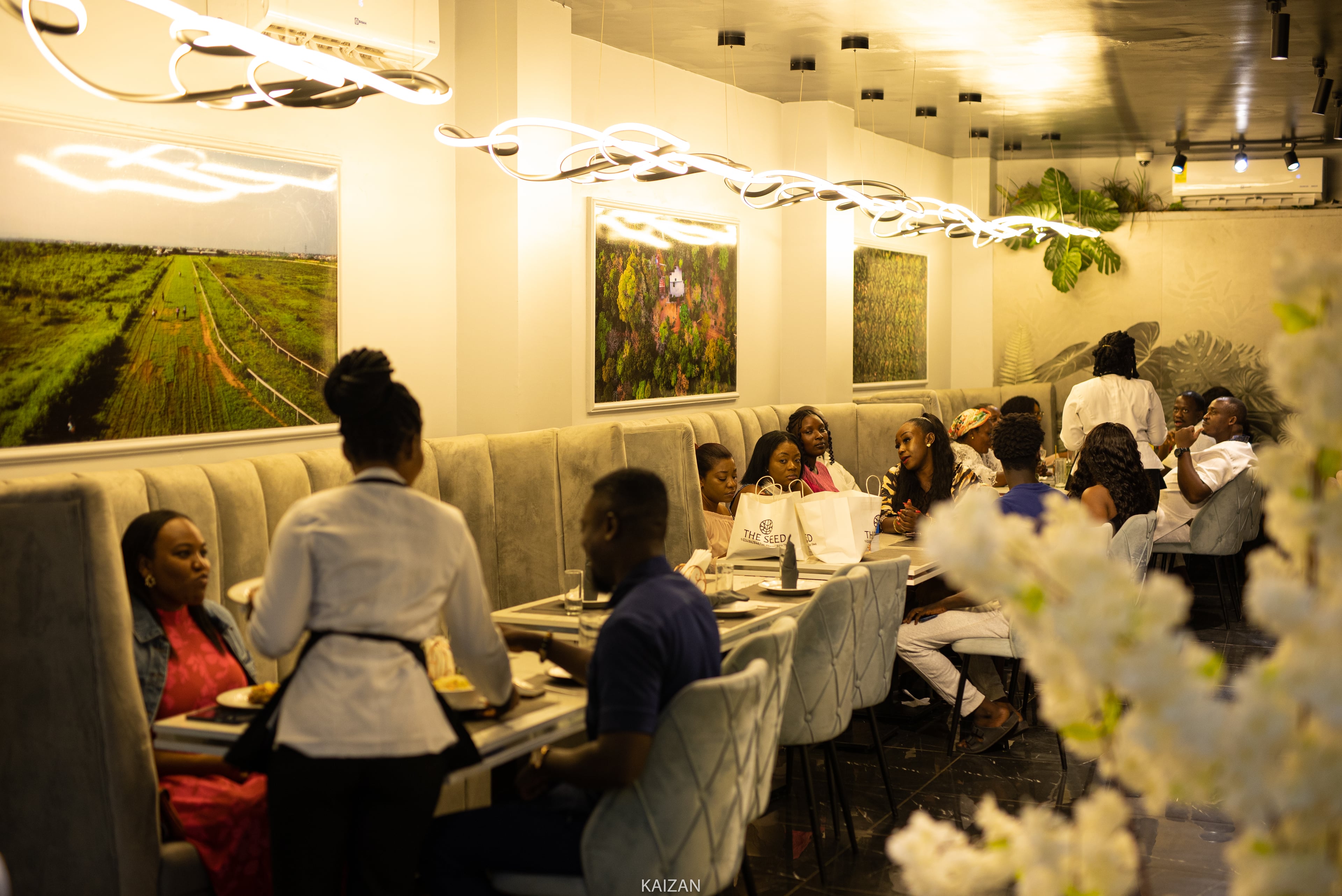 People sitting around a restaurant table